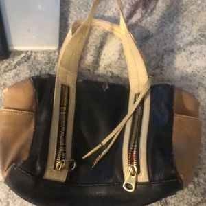 ISO this Carlos Santana bag